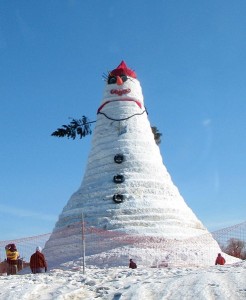 Townspeople and businesses in Bethel, Maine created "Olympia" the snow-woman, named after Maine senator Olympia Snowe, which is 122 feet, one inch high. It set a new Guinness world record, breaking a snowman also made in Bethel in 1999. It took more than a month to build, had a 100-foot scarf, 27-foot evergreen trees for arms, and the eyelashes were made of old skis donated from nearby ski resort Sunday River.