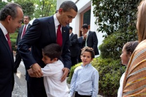 President Barack Obama bids farewell to the family of Mexican President Felipe Calderon following their meeting in Mexico City, Thursday, April 16, 2009. Author: Pete Souza, White House photographer