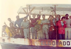 A boat crowded with Cuban refugees arrives in Key West, Florida, during the 1980 Mariel Boatlift.