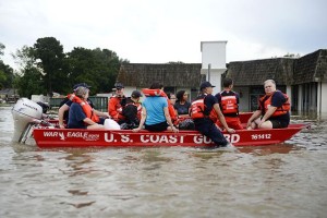 Coast Guardsmen rescue stranded residents from high water during severe flooding around Baton Rouge, LA on Aug. 14, 2016. Coast Guard photo by Petty Officer 3rd Class Brandon Giles 